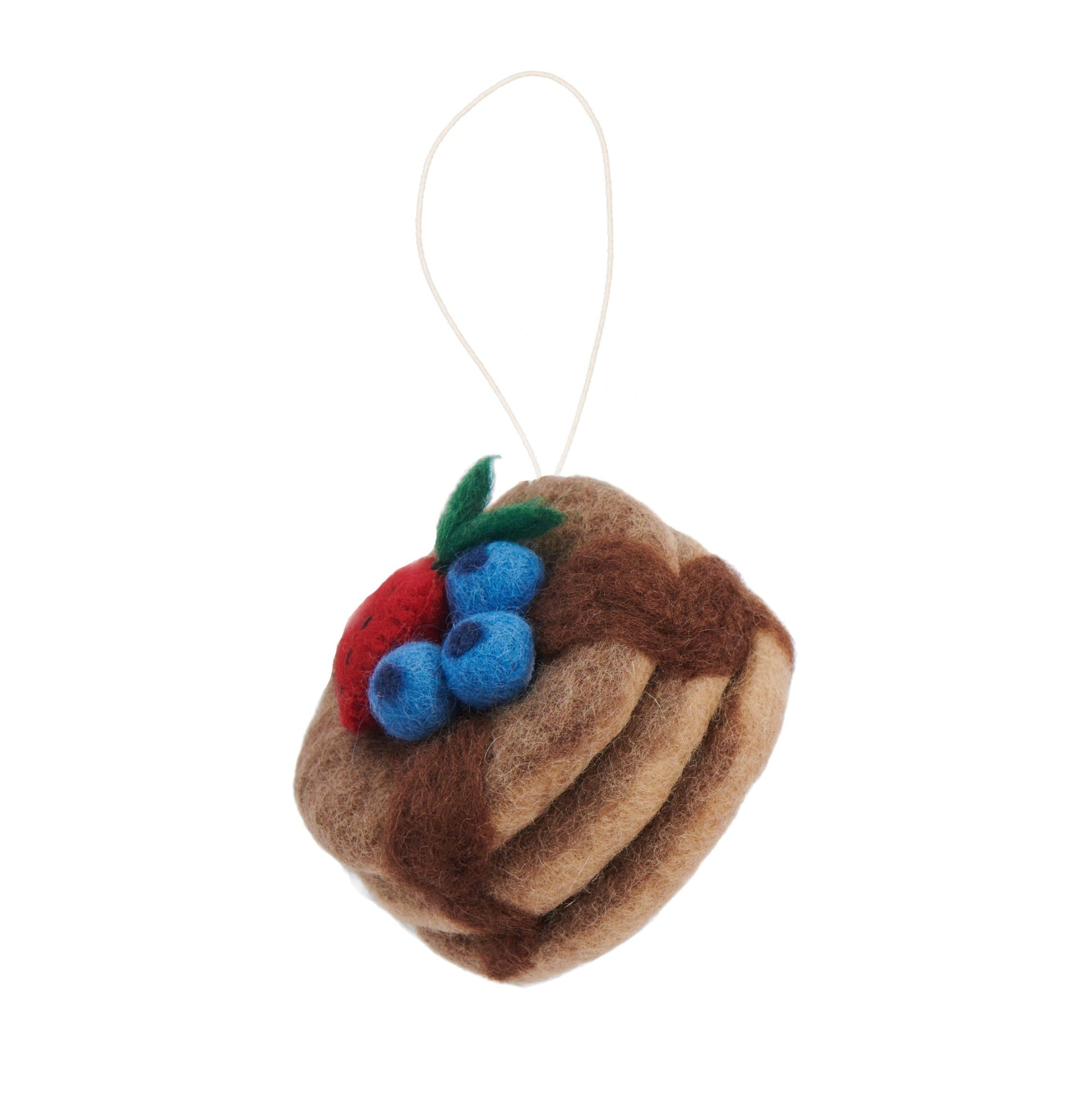 Felt ornament of pancake stack with blueberries and strawberry on top.