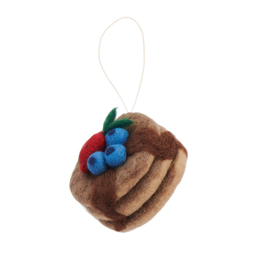 Felt ornament of pancake stack with blueberries and strawberry on top.