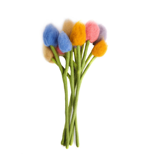 Bunch of felt bunny tail flowers in blue, yellow, pink, and purple.