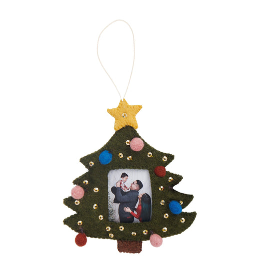 Felt Christmas tree ornament with frame in the center to display a photo. The tree has gold baubles, red, blue and pink round ornaments, and a yellow star on top.