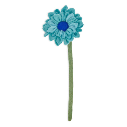 Blue felt dahlia flower with dark blue center.
