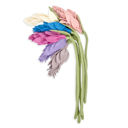 Bunch of felt wisteria flowers in light pink, white, blue, fuchsia, purple, and light purple.