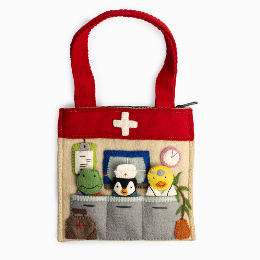A healthcare theme puppet bag with a doctor's office scene and finger puppets of a duck doctor, a nurse penguin, and a frog patient with a bandaged arm.