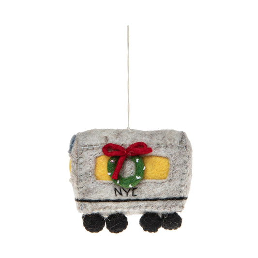 Felt ornament of a New York City subway car with a Christmas wreath on it.