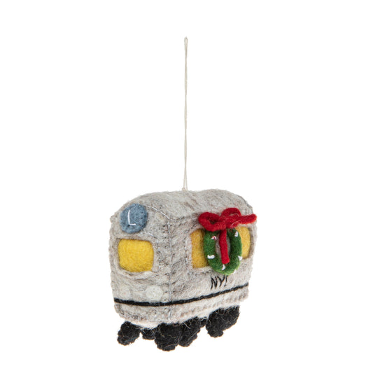 Felt ornament of a New York City subway car with a Christmas wreath on it.