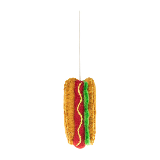 Felt ornament of a New York hot dog with mustard and relish.