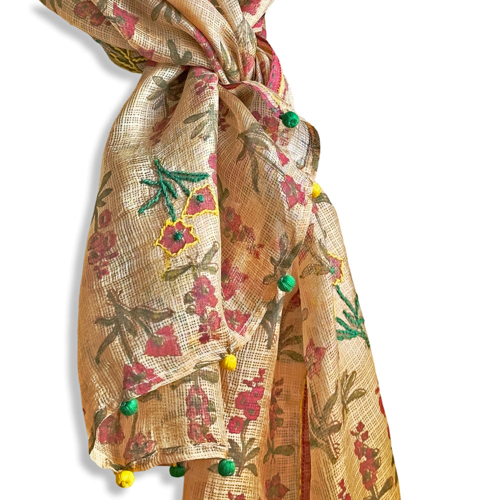 Closeup of natural dyed silk stole with pink, green, yellow flowers.