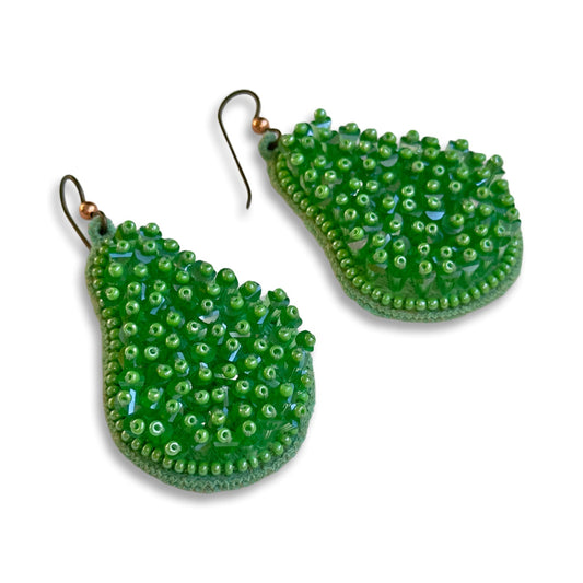 Pair of pincushion beaded green glass tassel earrings.