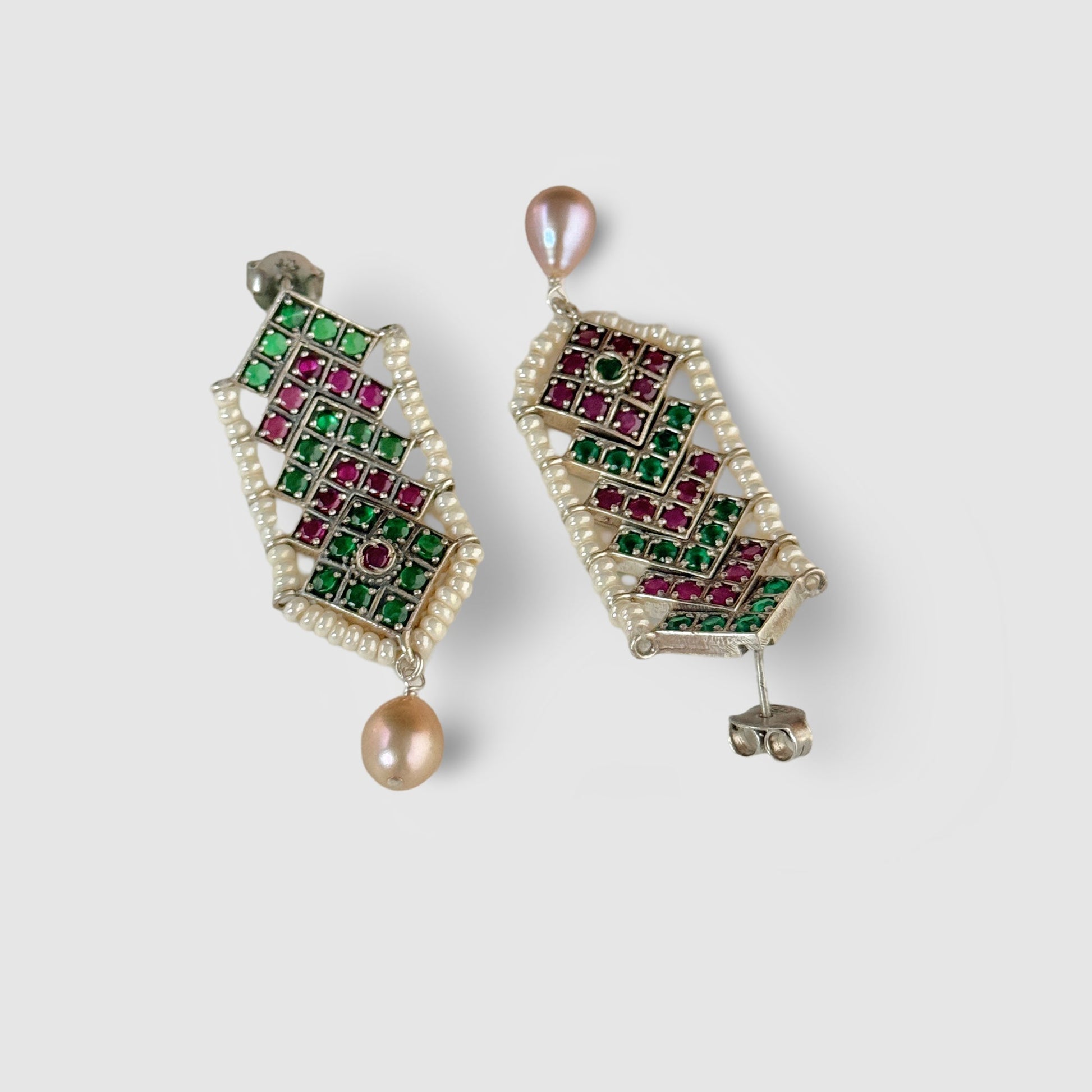 Pair of silver, red and green lattice post earrings with drop pearl.