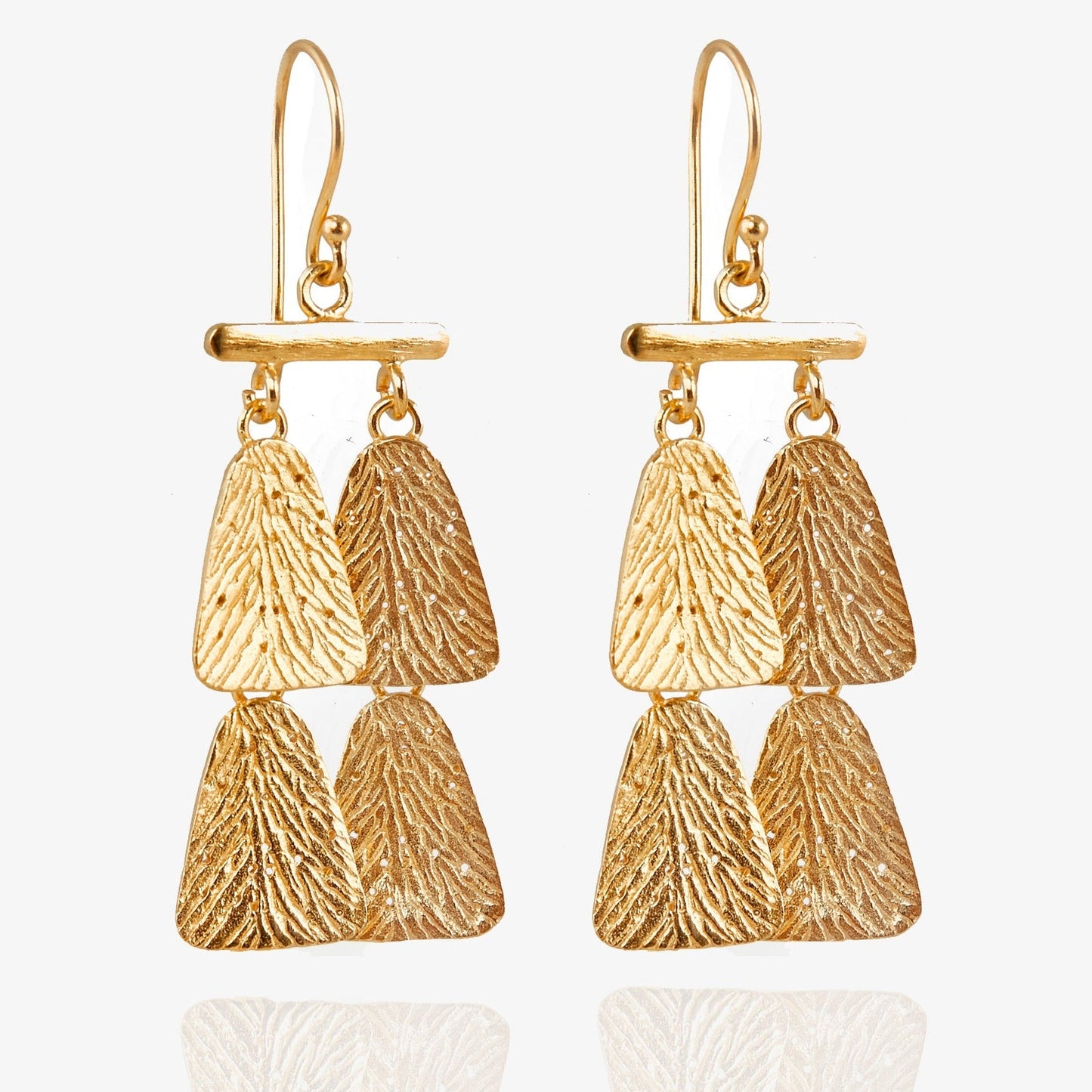 Pair of gold dangle earrings, each with four parts.