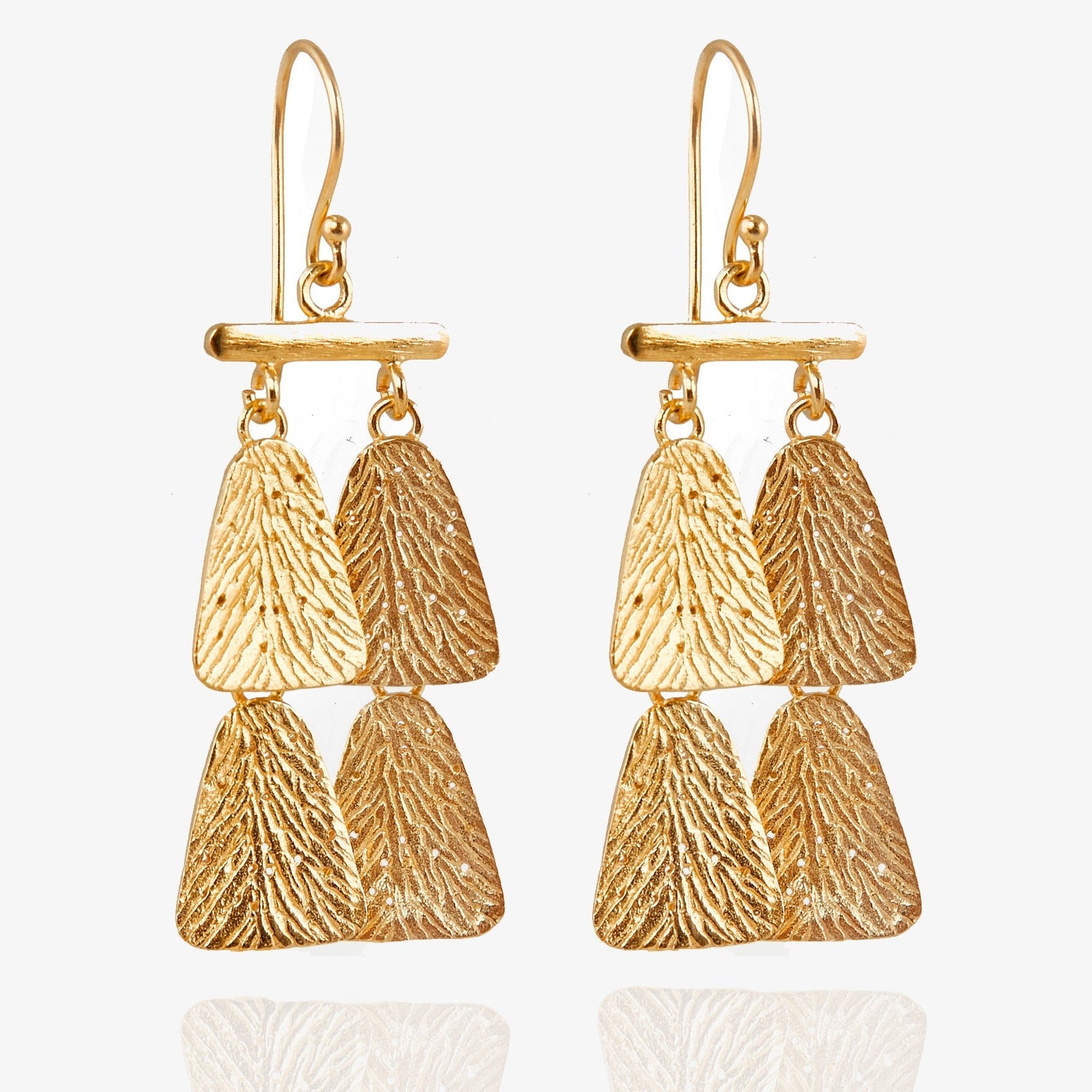 Pair of gold dangle earrings, each with four parts.