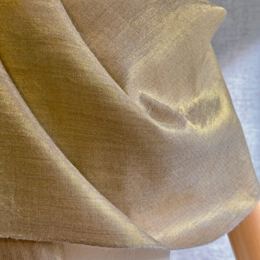 Closeup of the gold material.