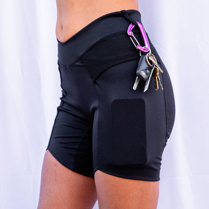 Closeup of black toura short with carabiner and keys hanging from short loop.