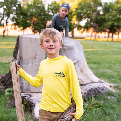 two kids playing in Play Outside's bamboo ONE all weather adventure shirts