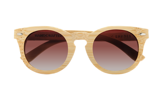 Front view of natural tan bamboo sunglasses with round gradient amber tinted lenses.