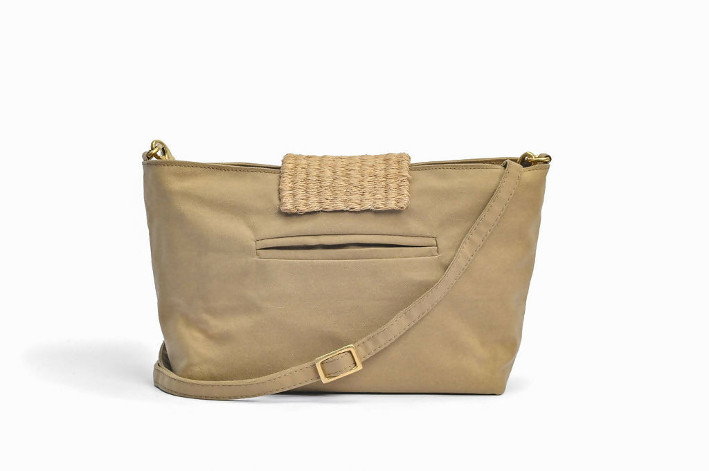 Back view of sandstone green bag with pocket and cloth strap.